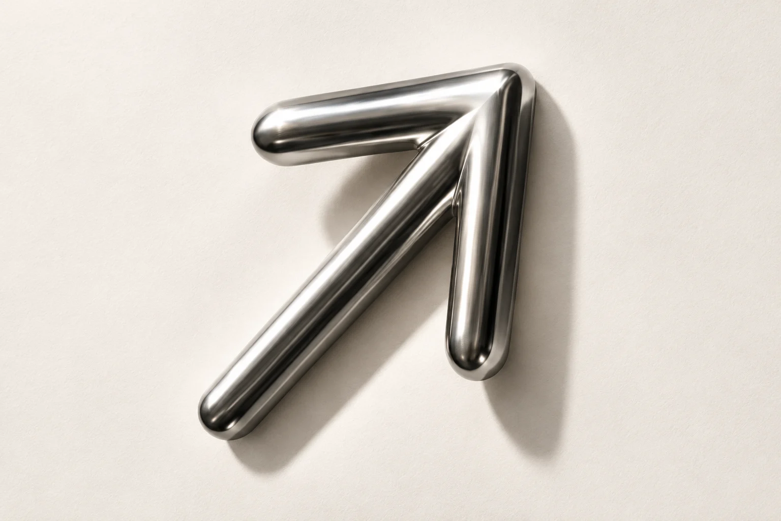Polished metal arrow pointing up and to the right